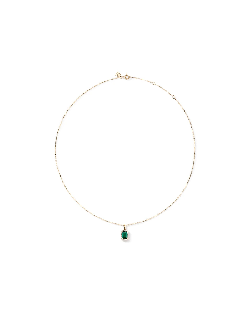 Pendentif en or jaune 10 carats avec chaîne et émeraude verte synthétique taillée en émeraude et halo de diamants