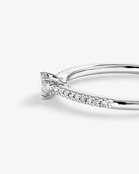 0.25 Carat TW Round Brilliant Diamond Side Accent Engagement Ring in 14kt White Gold