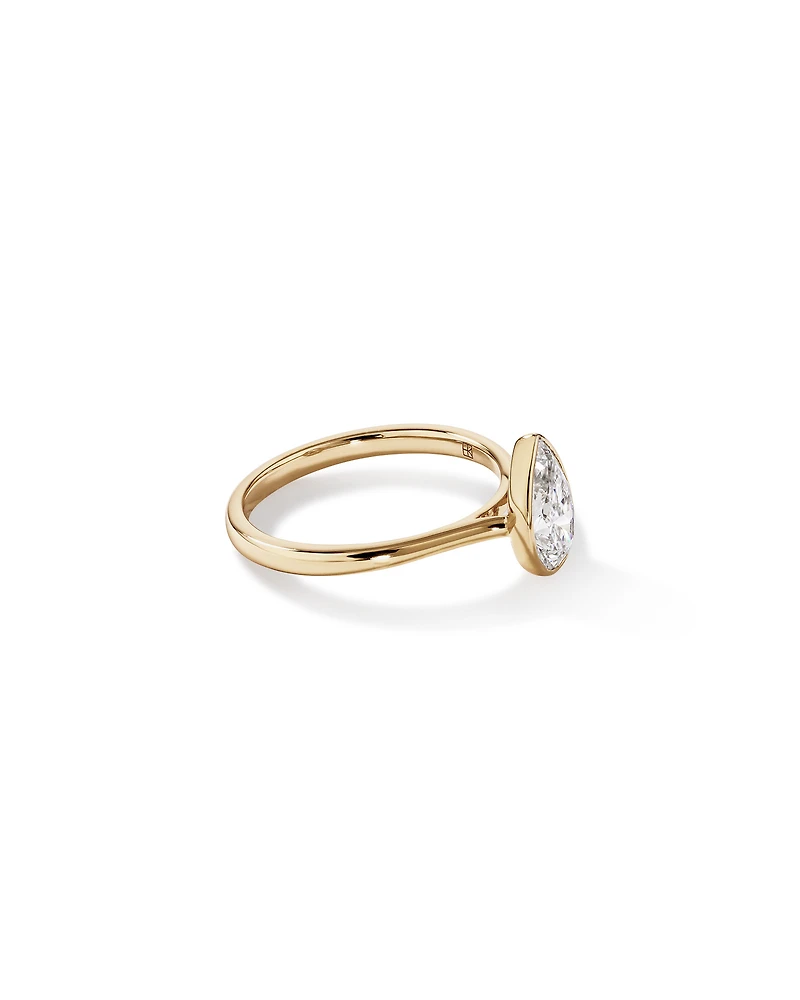1.25 Carat TW Pear Cut Laboratory-Grown Diamond Solitaire Bezel Set Engagement Ring 14kt Yellow Gold