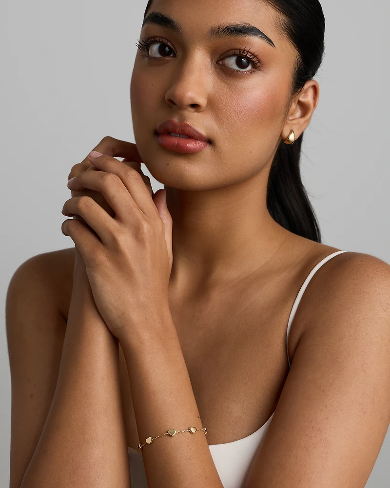 19cm (7.5") Heart Station Bracelet in 10kt Yellow Gold