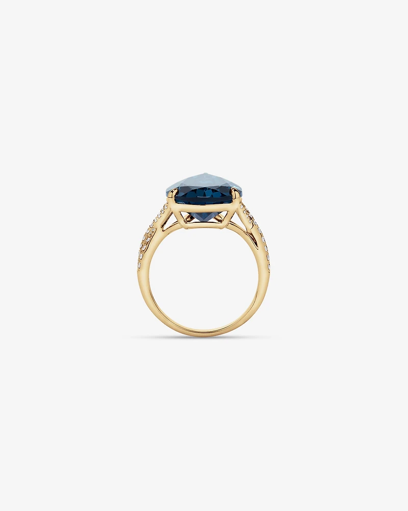 Pear Cut London Blue Topaz & 0.28 Carat TW Diamond Twist Ring 10kt Yellow Gold