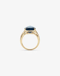 Pear Cut London Blue Topaz & 0.28 Carat TW Diamond Twist Ring 10kt Yellow Gold