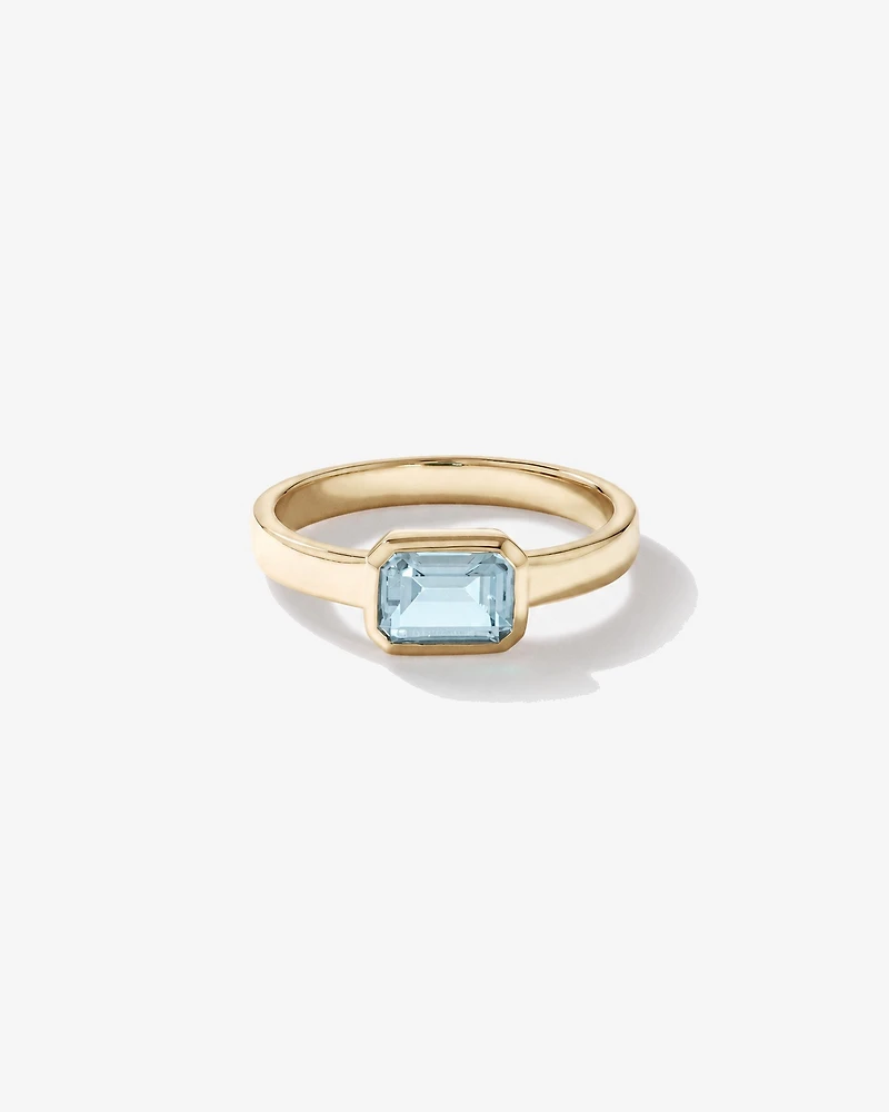 Bague Aigue-marine sertie clos en or jaune 10 ct