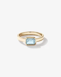 Bague Aigue-marine sertie clos en or jaune 10 ct
