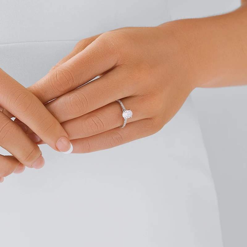 Oval Solitaire Engagement Ring with 1.12kt TW of Diamonds in 14ct White Gold