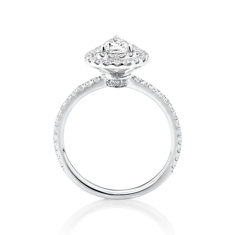Halo Ring with 0.90 Carat TW of Diamonds in 18kt White Gold