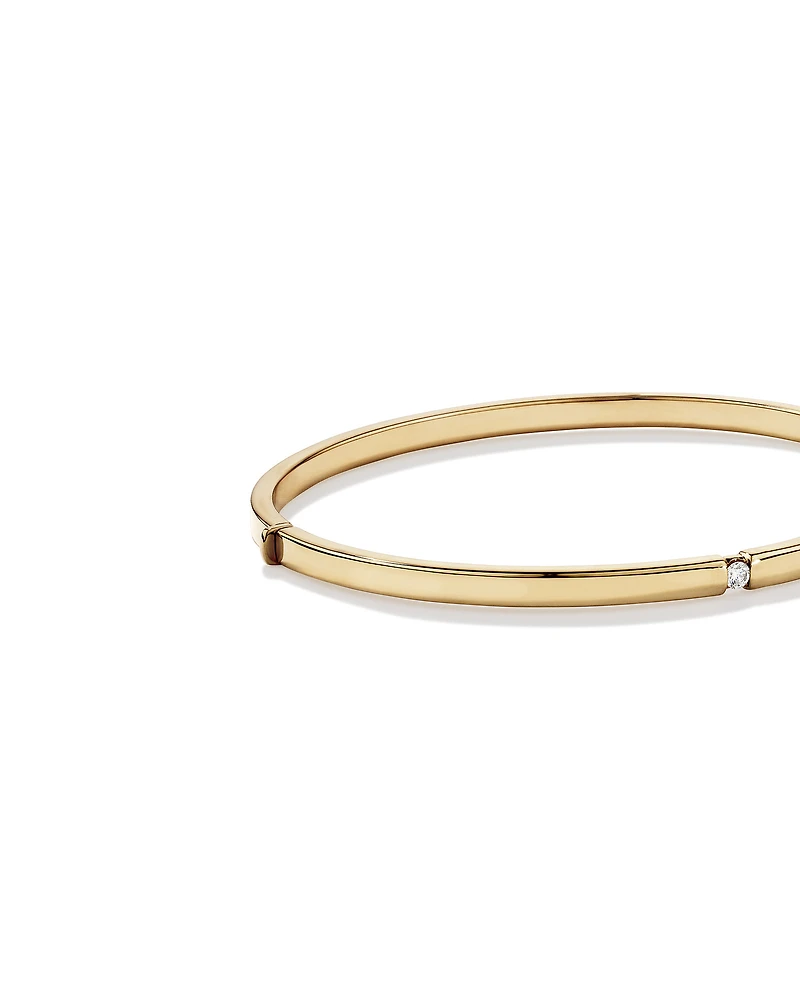 Diamond Accent Oval Bangle in 10kt Yellow Gold
