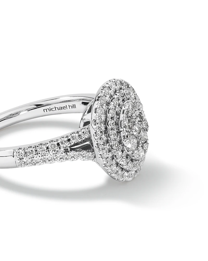 0.65 Carat TW Oval Shaped Cluster Halo Diamond Ring in 10kt White Gold