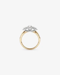 0.69 Carat TW Three Stone Oval and Pear Cut Diamond Halo Engagement Ring in 14kt Yellow and White Gold