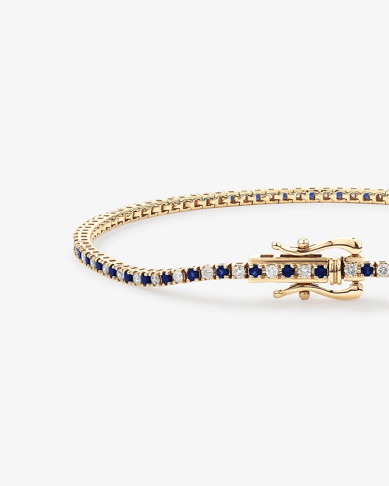 0.68 Carat TW Diamond and Created Sapphire Tennis Bracelet in 10kt Yellow Gold