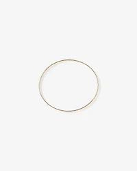 65mm (2.5") 5.7mm Width Solid Oval Bangle in 10kt Yellow Gold
