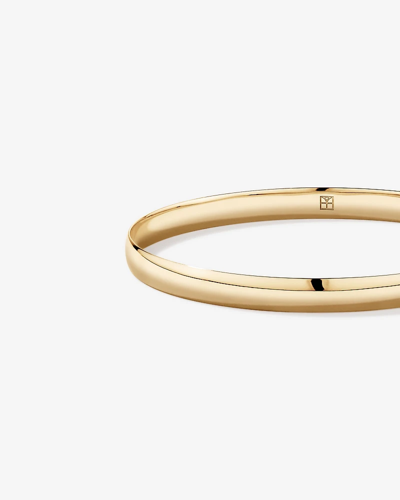 65mm (2.5") 5.7mm Width Solid Oval Bangle in 10kt Yellow Gold