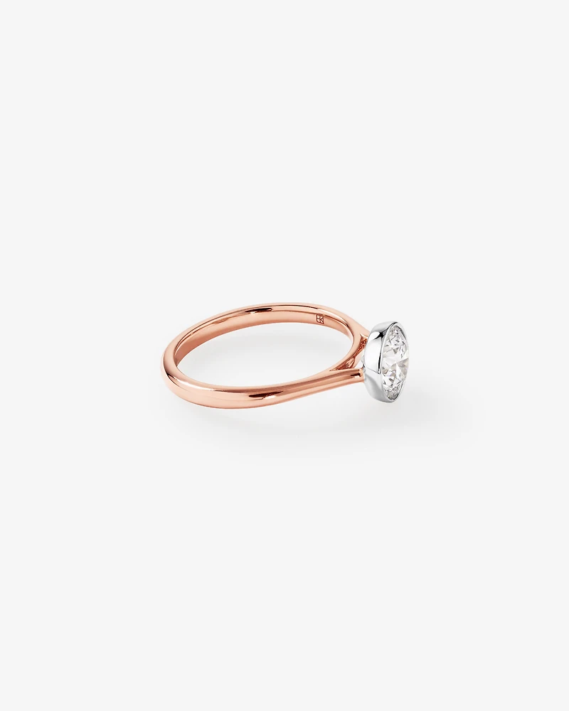 1.25 Carat TW Round Brilliant Laboratory-Grown Diamond Solitaire Bezel Set Engagement Ring in 14kt Rose Gold