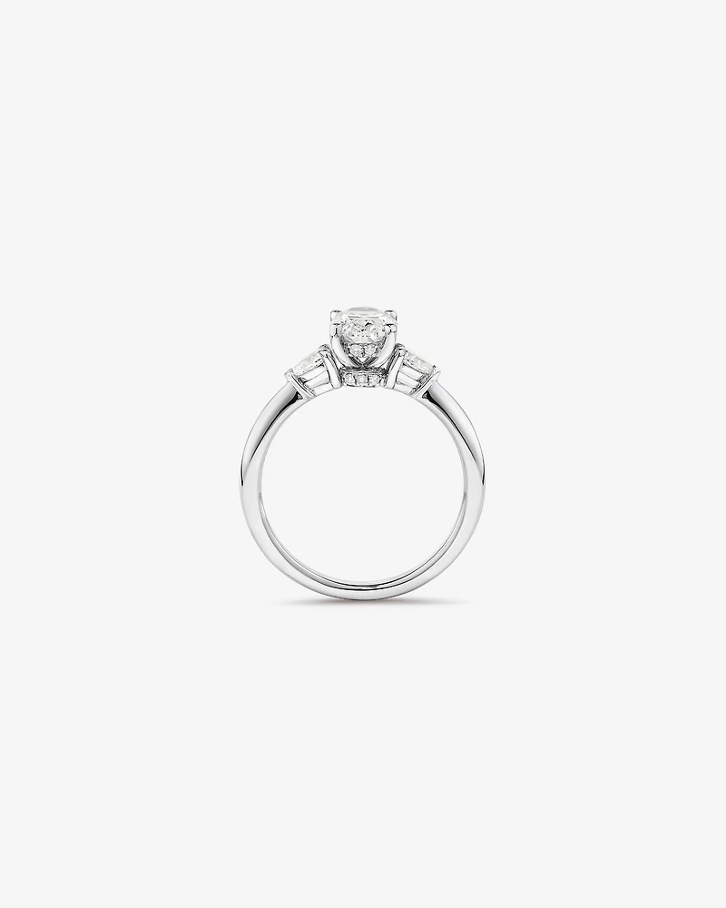 1.10 Carat TW Three Stone Oval and Pear Hidden Halo Engagement Ring in Platinum