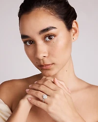 1.04 Carat TW Oval Cut Diamond Fancy Halo Engagement Ring in 14kt White Gold