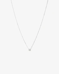 0.23 Carat TW Emerald Diamond Halo Pendant in 10kt White Gold