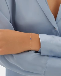 Boutons d'oreilles en or jaune 10 K avec tanzanite