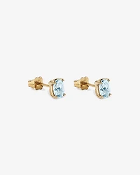 Boucles d'oreilles puces ovales Aigue-marine en or jaune 10 ct