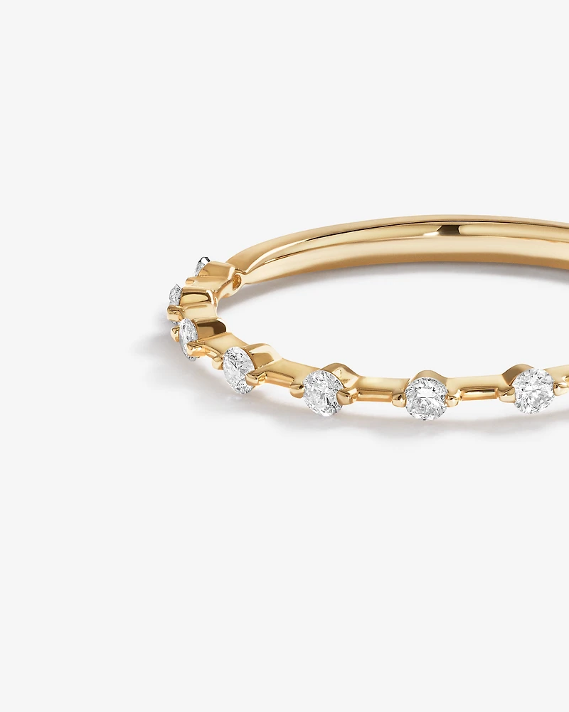 0.15 Carat TW Diamond Station Wedding Ring in 14kt Yellow Gold