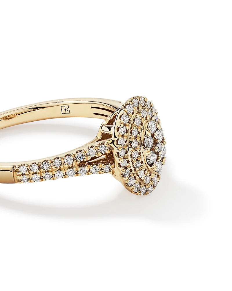 0.30 Carat TW Oval Shaped Cluster Halo Diamond Ring in 10kt Yellow Gold