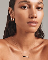 Collier avec barre en or jaune 10 K