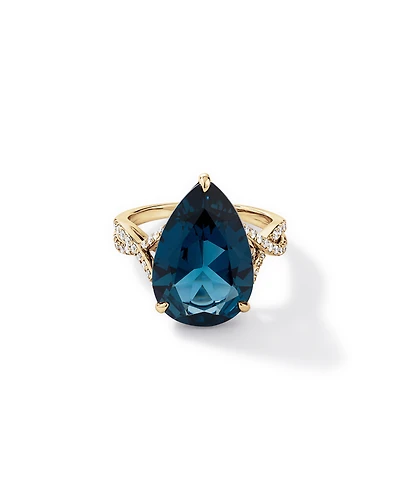Pear Cut London Blue Topaz & 0.28 Carat TW Diamond Twist Ring 10kt Yellow Gold