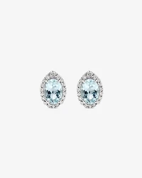 Oval Cut Blue Aquamarine Gemstone and 0.27 Carat TW Diamond Halo Stud Earrings in 10kt White Gold