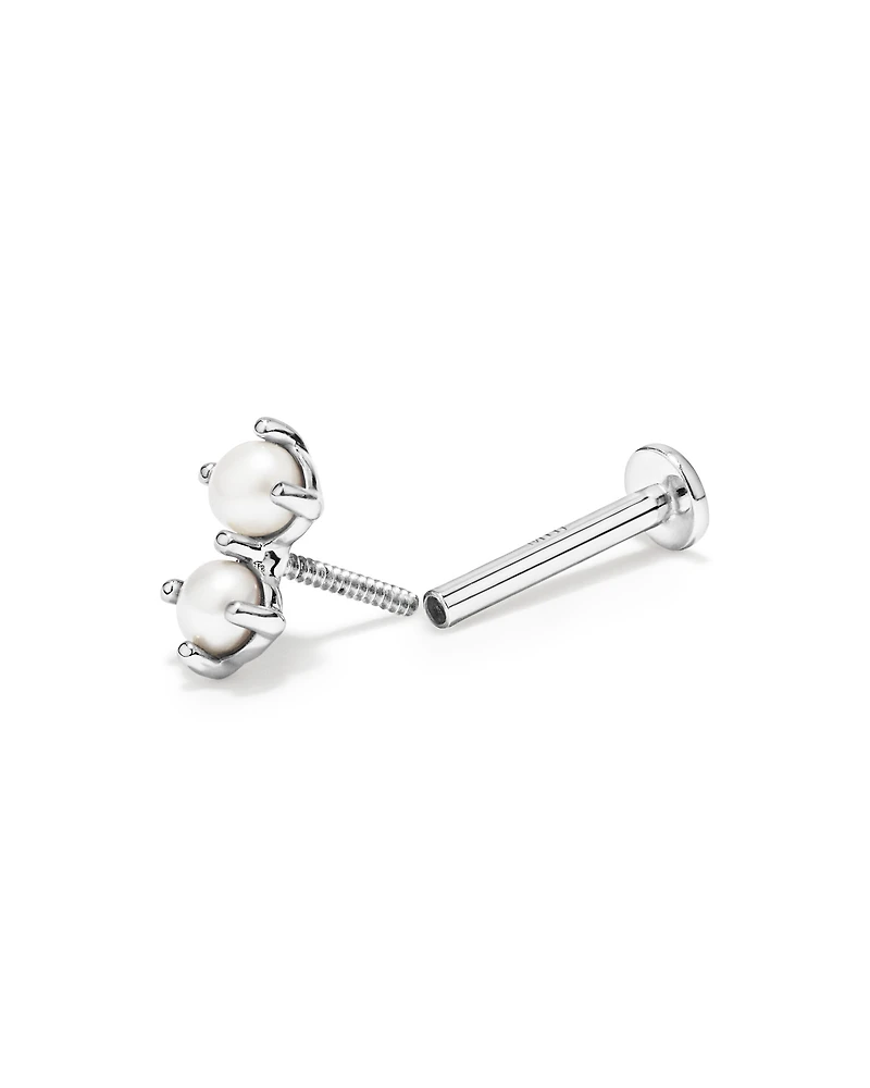 Boucle d'oreille hélix deux pierres en perles de culture d'eau douce et or blanc 10 carats