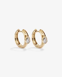 0.50 Carat TW of Laboratory-Grown Pear Cut Diamond Huggie Earrings in 10kt Yellow Gold