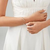 0.68 Carat TW Diamond Row Flex Bangle in 10kt Gold