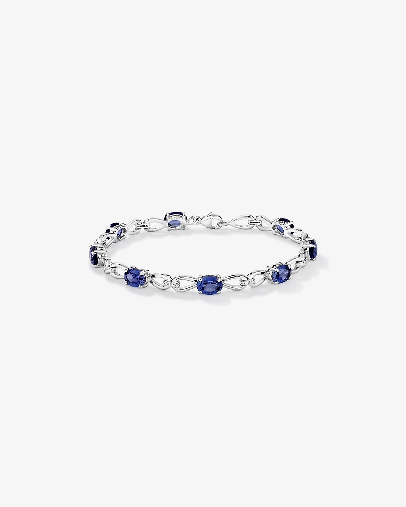 Oval Cut Blue Created Sapphire Gemstone and Diamond Bracelet in Sterling Silver