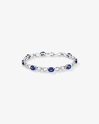 Oval Cut Blue Created Sapphire Gemstone and Diamond Bracelet in Sterling Silver