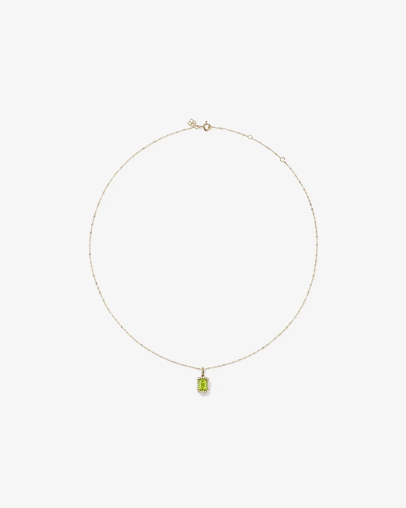 Pendentif halo Péridot taille émeraude avec diamants et chaîne en or jaune 10 ct