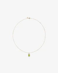 Pendentif halo Péridot taille émeraude avec diamants et chaîne en or jaune 10 ct