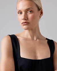 0.25 Carat TW Round Brilliant Diamond Solitaire Bezel Set Stud Earrings 18kt White Gold