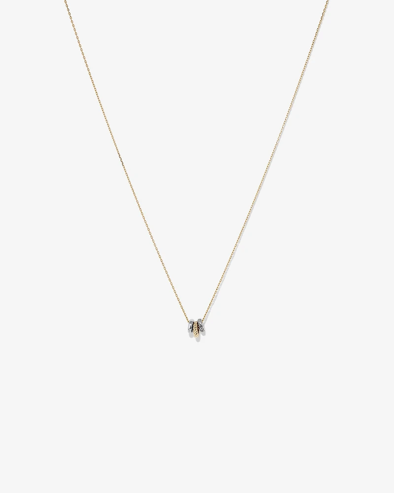 Trio Pendant with .09 Carat TW Diamonds in Sterling Silver and 10kt Yellow gold