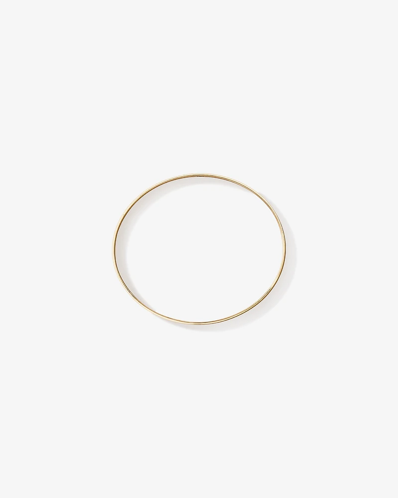 65mm (2.5") 7.7mm Width Solid Oval Bangle in 10kt Yellow Gold