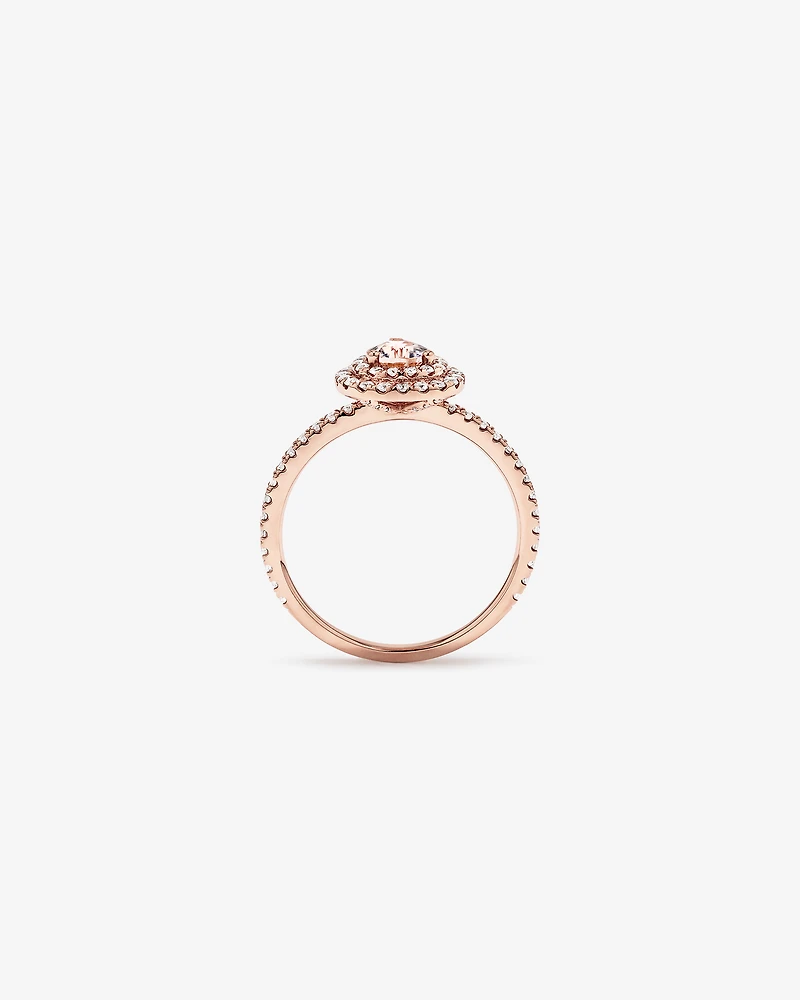 Pear Cut Morganite Gemstone and 0.45 Carat TW Diamond Halo and Side Accent Engagement Ring in 10kt Rose Gold