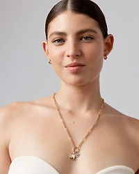 Pendentif mauvais œil diamant et saphir en or blanc 10 carats