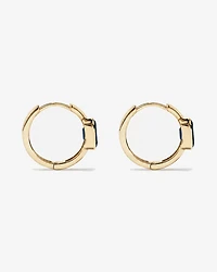Boucles d'oreilles anneaux Topaze bleu London serties clos en or jaune 10 ct