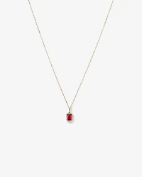 Pendentif halo Rubis créé taille émeraude avec diamants et chaîne en or jaune 10 ct