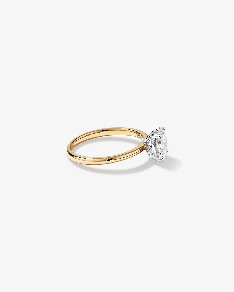 Bague solitaire en diamant canadien ovale 1,00 carat poids total en or jaune et blanc 18 kt