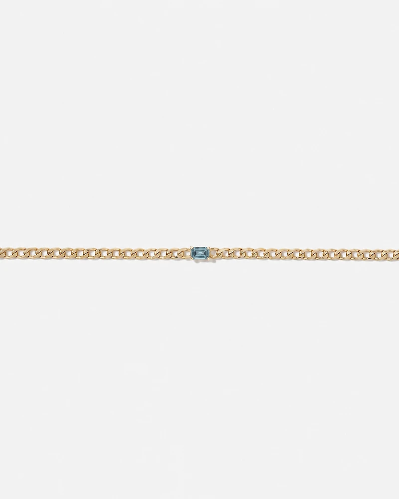 Blue Topaz Curb Link Bracelet in 10kt Yellow Gold