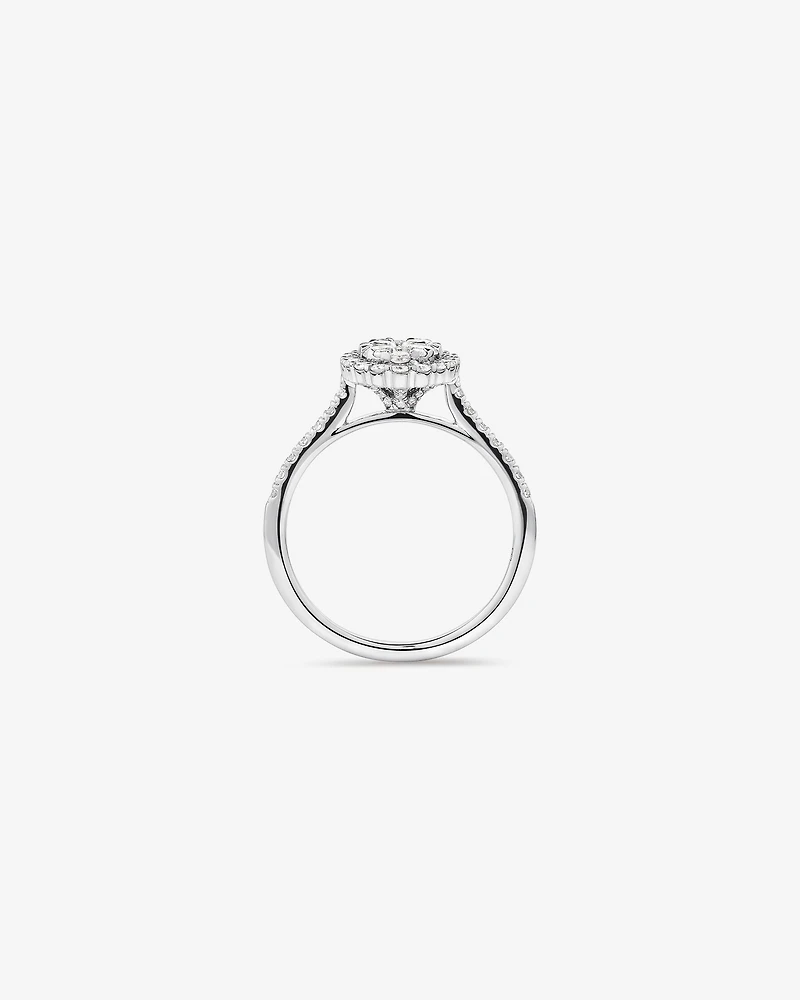 0.86 Carat TW Oval Shaped Cluster Diamond Halo Engagement Ring in 14kt White Gold