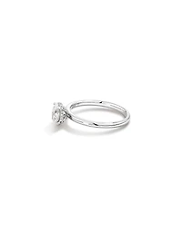 0.68 Carat TW Oval Cut Diamond Solitaire Hidden Pave Halo Engagement Ring in Platinum