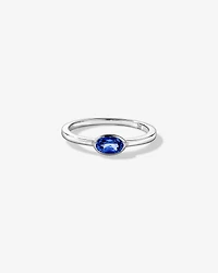 Oval Blue Created Sapphire East-to-West Set Bezel Ring 10kt Gold