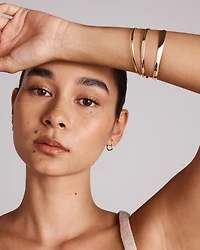 65mm (2.5") 5.7mm Width Solid Oval Bangle in 10kt Yellow Gold