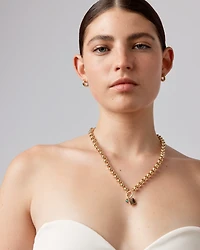 Round Created Green Emerald Birthstone Pendant in 10kt Yellow Gold