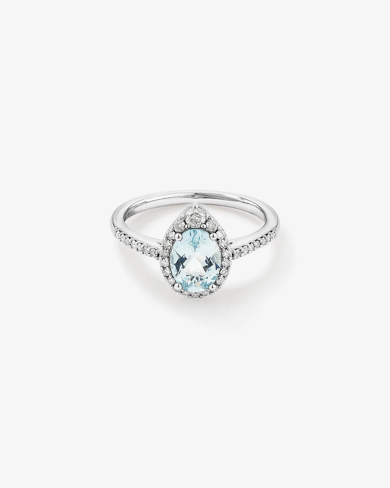 Oval Cut Blue Aquamarine Gemstone and 0.29 Carat TW Diamond Halo Ring in 10kt White Gold