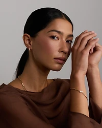 Huggies with 0.22 Carat TW of Diamonds in 10kt Yellow Gold